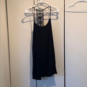 Never worn, short, black dress!